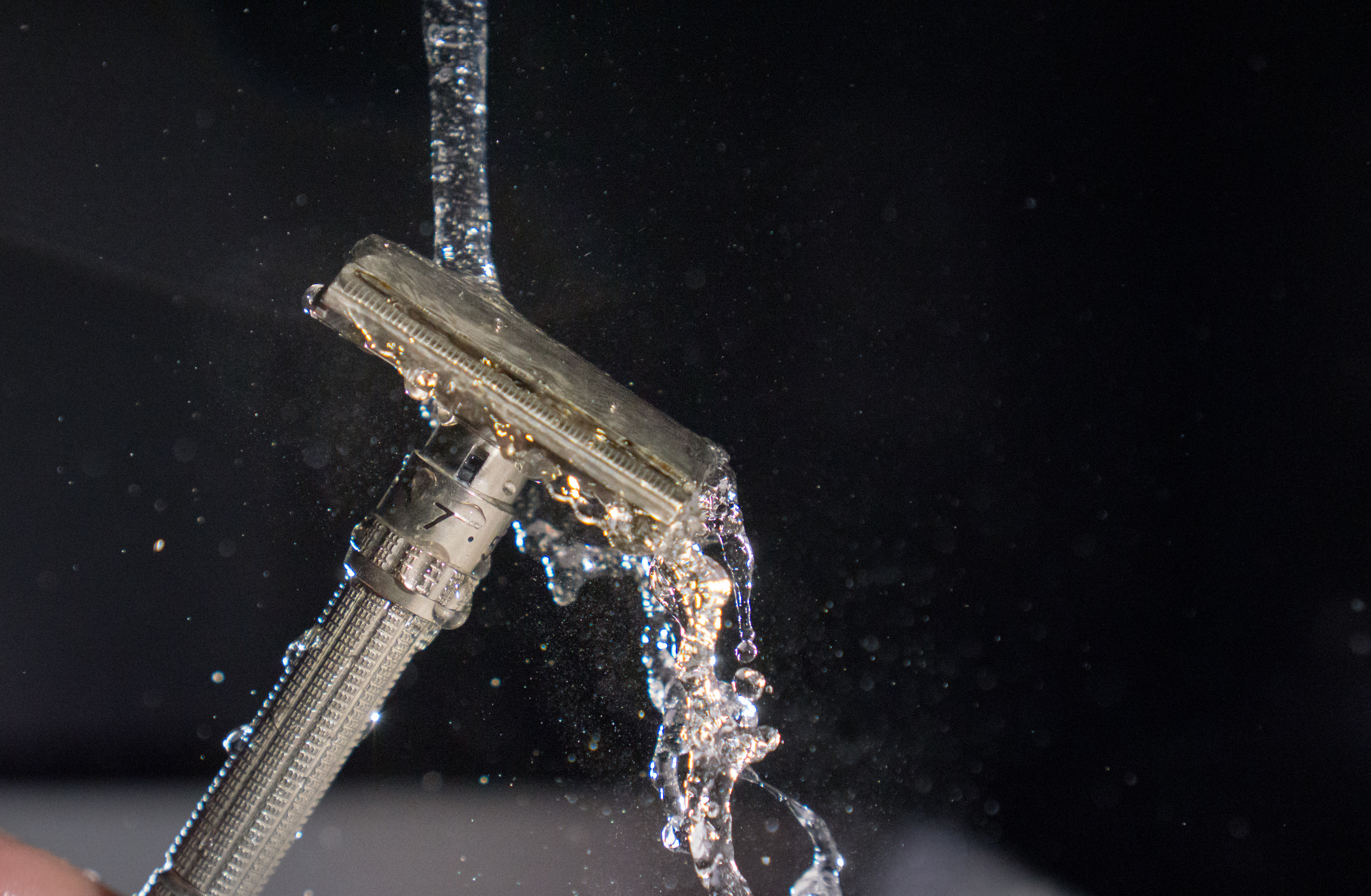 My razor, a Gillette slim adjustable from 1964. One of the few "Lindy" items that I own. A fun little afternoon trying to get a frozen time shot here.